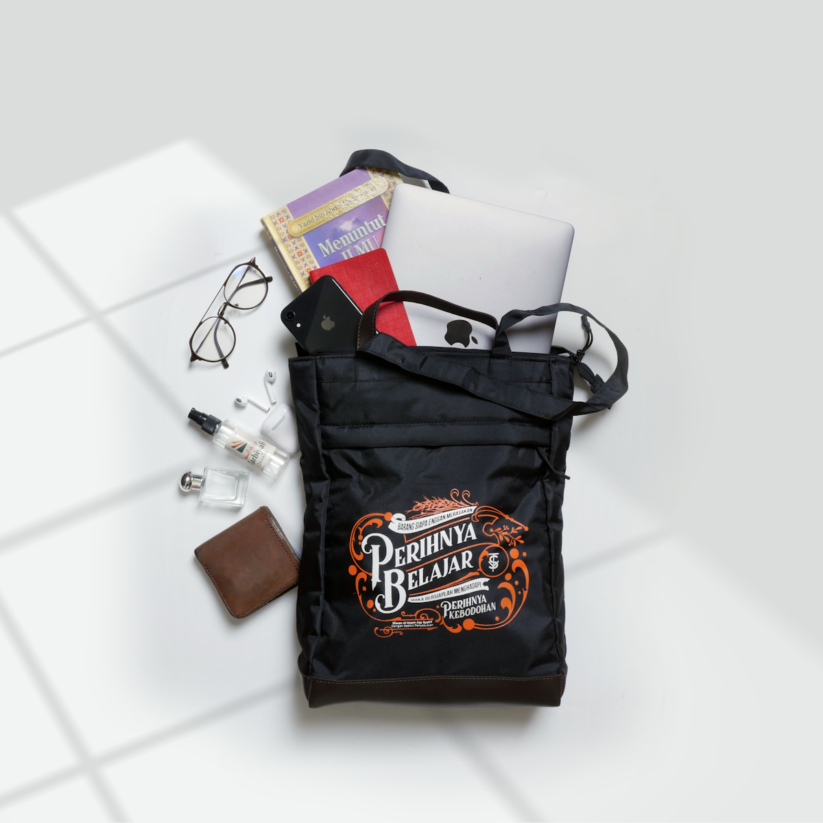 a black bag with some items inside of it