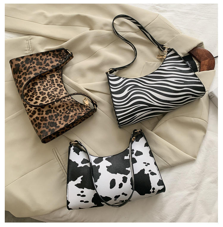 Unterarmtasche mit Leopardenmuster