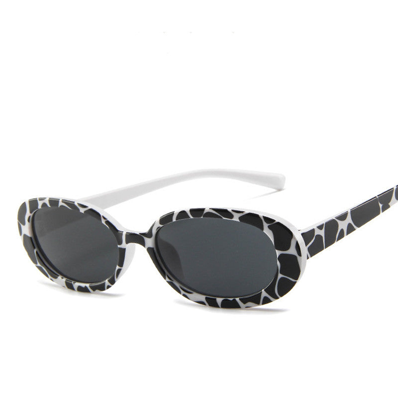 Europäische und amerikanische Mode Oval Frame Sonnenbrillen Cow Farbe Trendy Sonnenbrillen