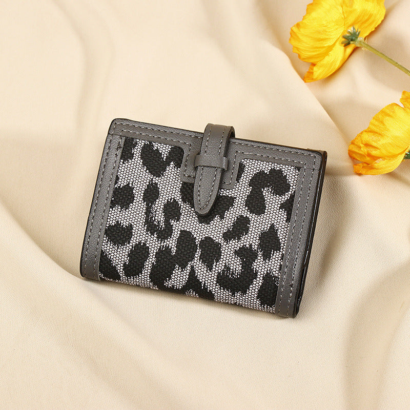 Frauen Brieftasche kurz neue Leopard Print Pull-Gürtel Multi-funktionale große Kapazität Tri-Fold Retro mehrere Kartenschlitze Kupplung Karteninhaber