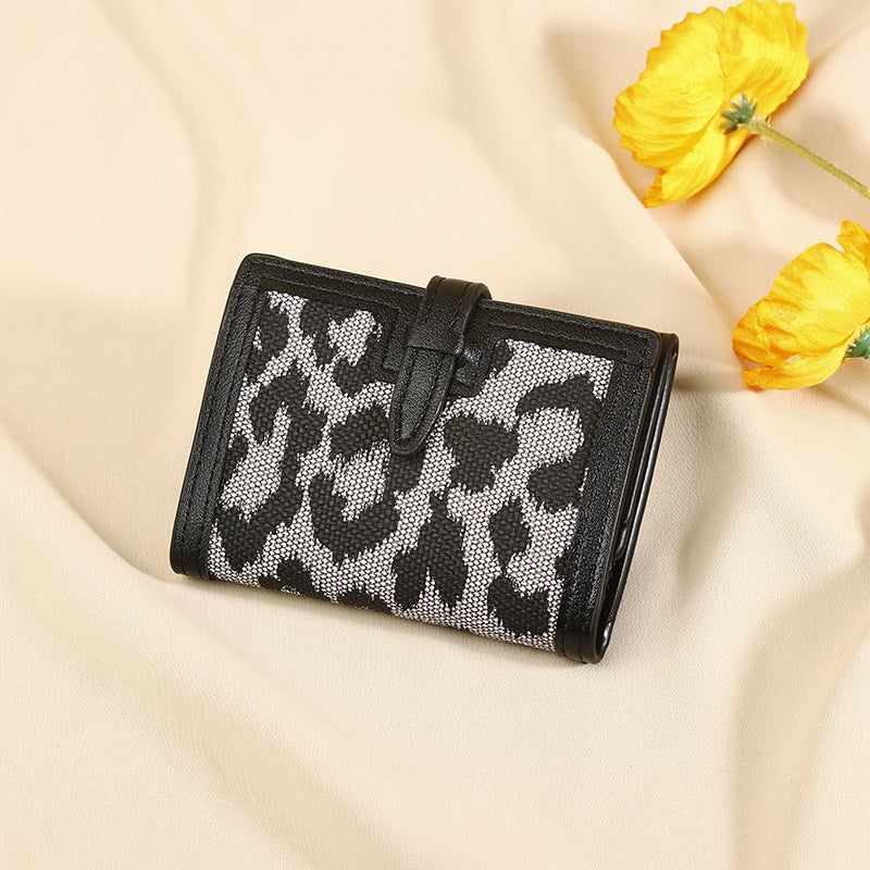 Frauen Brieftasche kurz neue Leopard Print Pull-Gürtel Multi-funktionale große Kapazität Tri-Fold Retro mehrere Kartenschlitze Kupplung Karteninhaber