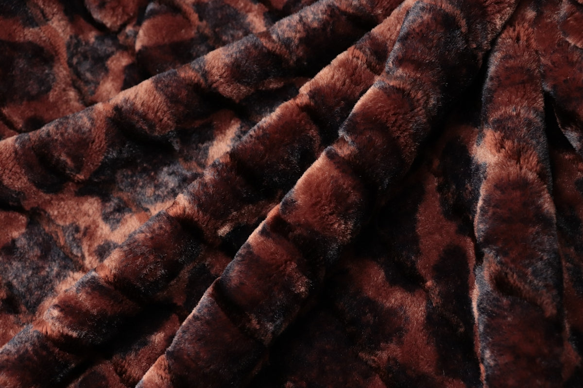 a brown and black animal print fabric