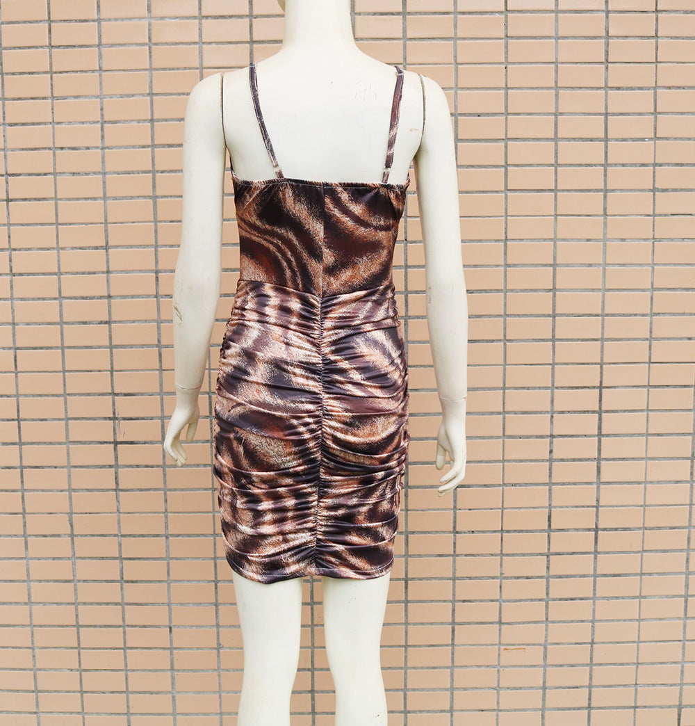Schmales Kleid mit Leopardenmuster in der Tasche